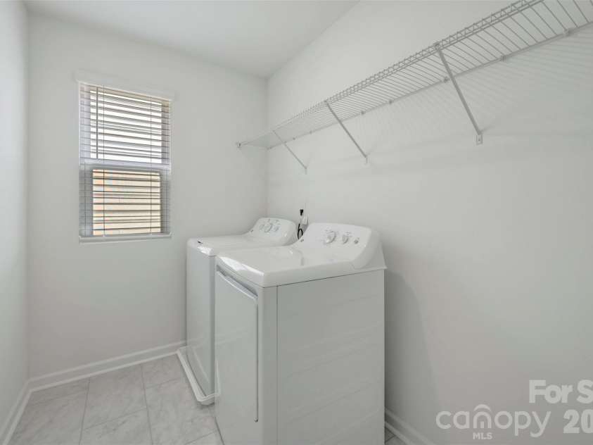 1410 Bucknell Street, Wingate, NC 28174.  MLS# CAR4429173, YatesRealty ID 53794. Laundry room