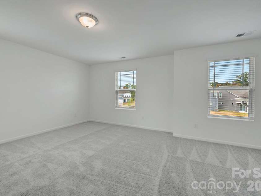 1410 Bucknell Street, Wingate, NC 28174.  MLS# CAR4429173, YatesRealty ID 53794. Owner's suite