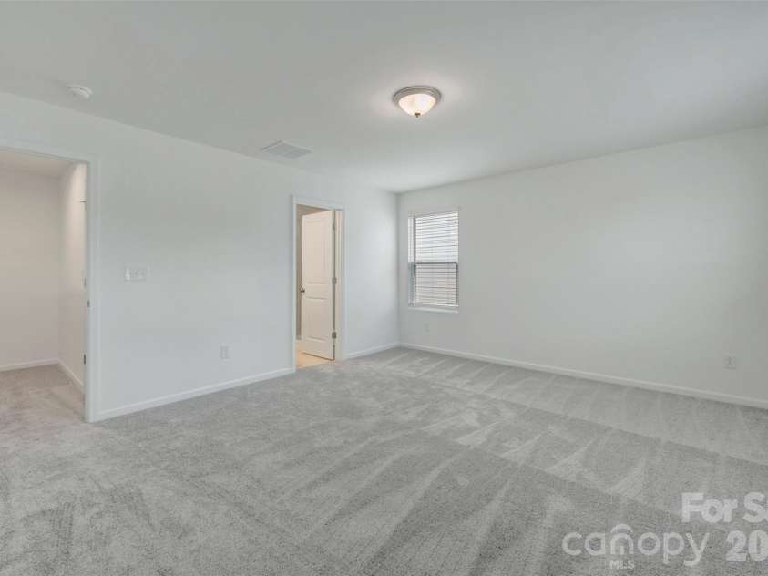1410 Bucknell Street, Wingate, NC 28174.  MLS# CAR4429173, YatesRealty ID 53794. Owner's suite