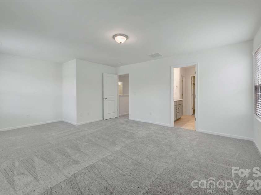 1410 Bucknell Street, Wingate, NC 28174.  MLS# CAR4429173, YatesRealty ID 53794. Owner's suite