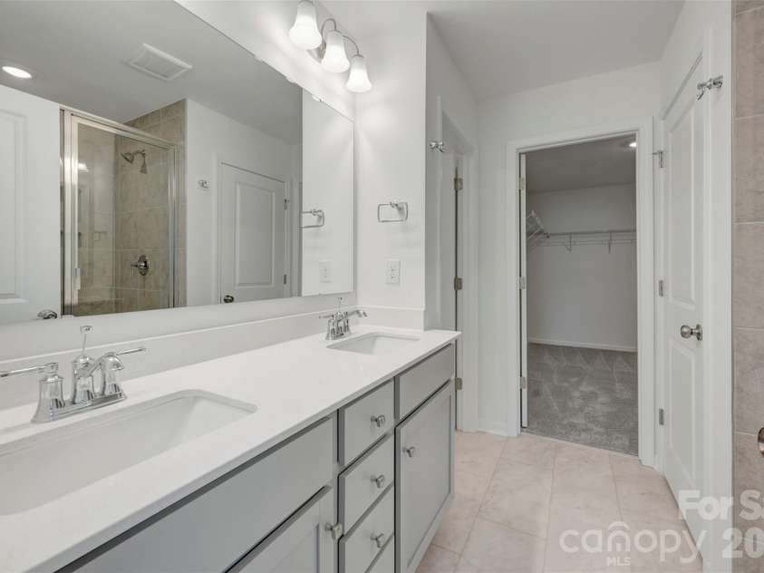 1410 Bucknell Street, Wingate, NC 28174.  MLS# CAR4429173, YatesRealty ID 53794. Owner's suite