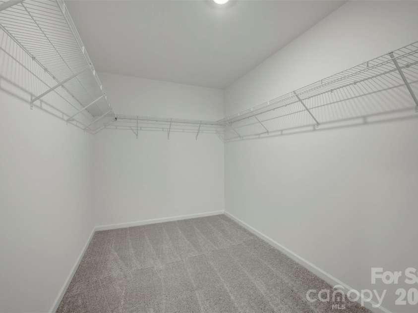 1410 Bucknell Street, Wingate, NC 28174.  MLS# CAR4429173, YatesRealty ID 53794. Owner's suite