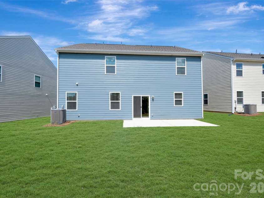 1410 Bucknell Street, Wingate, NC 28174.  MLS# CAR4429173, YatesRealty ID 53794. Rear exterior