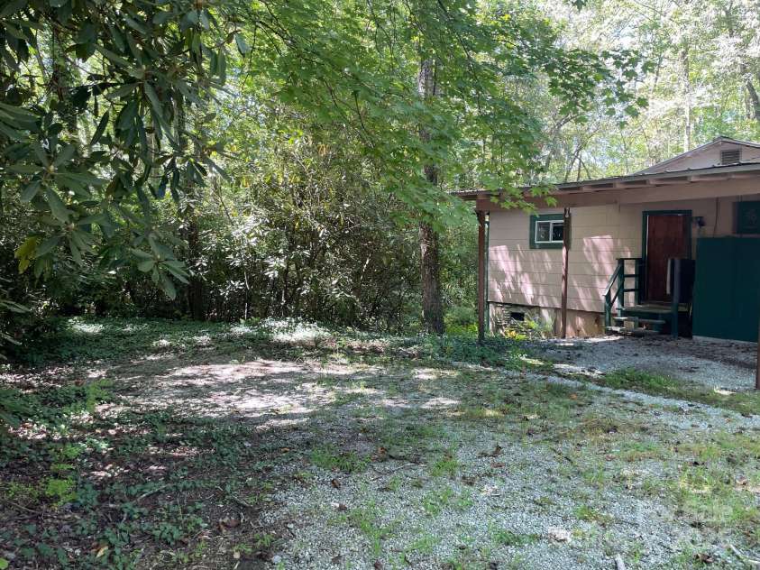 142 Whitewater Road, Sapphire, NC 28774.  MLS# CAR4229231, YatesRealty ID 538. Back of second home 