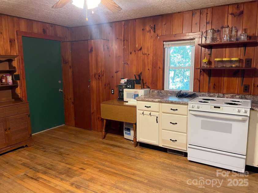 142 Whitewater Road, Sapphire, NC 28774.  MLS# CAR4229231, YatesRealty ID 538. Kitchen of second home 