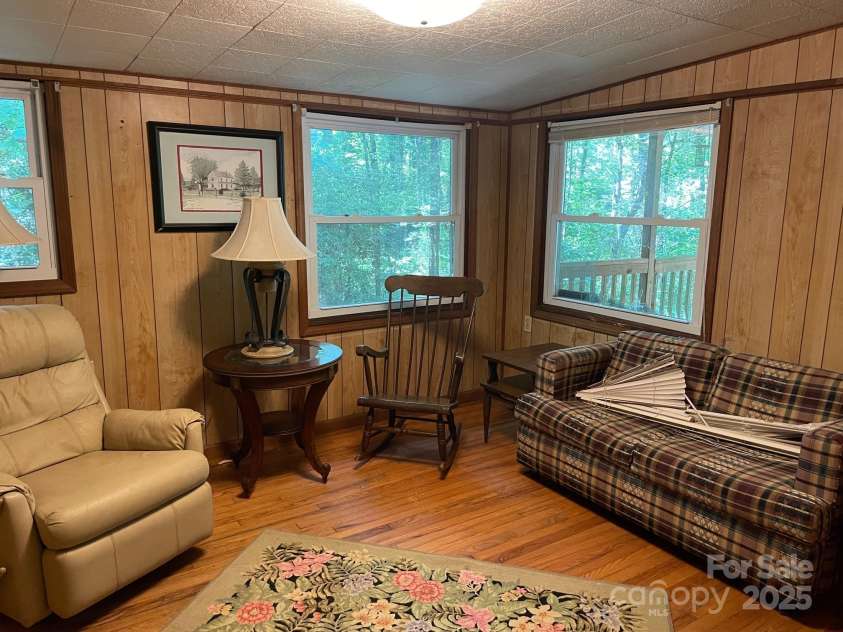 142 Whitewater Road, Sapphire, NC 28774.  MLS# CAR4229231, YatesRealty ID 538. Living room second home. 