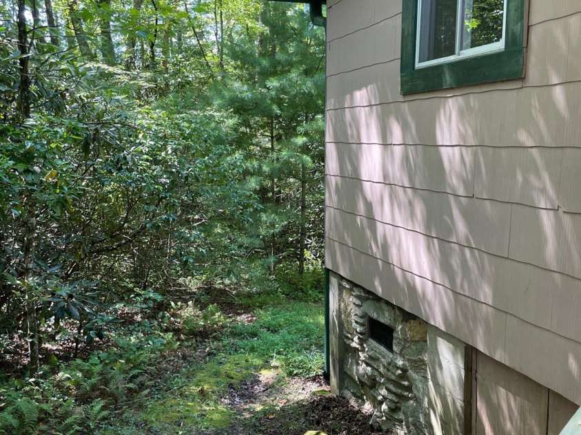 142 Whitewater Road, Sapphire, NC 28774.  MLS# CAR4229231, YatesRealty ID 538. Side of second home 