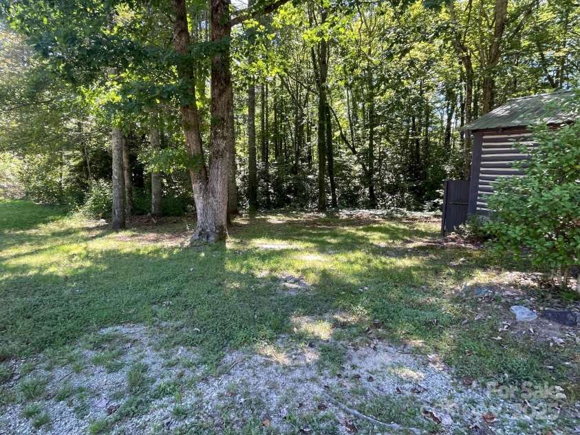 142 Whitewater Road, Sapphire, NC 28774.  MLS# CAR4229231, YatesRealty ID 538. This is to the left of the small home where the vacant lot is. 