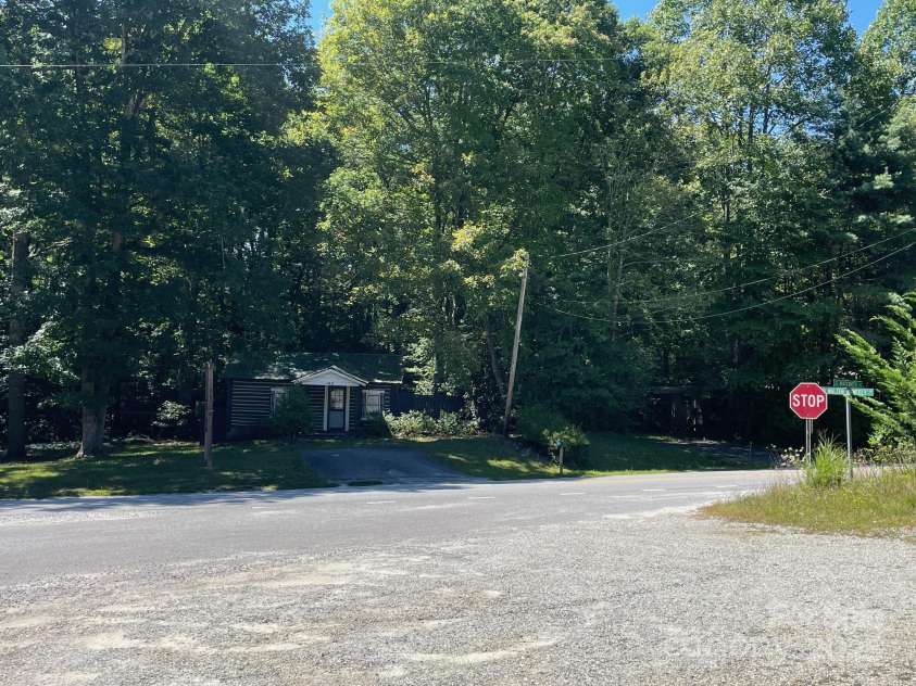 142 Whitewater Road, Sapphire, NC 28774.  MLS# CAR4229231, YatesRealty ID 538. View from across the road at the community center. 
