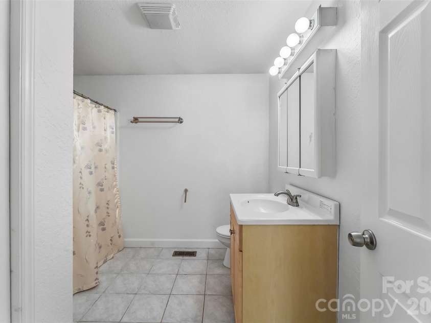 221 Old US 70 Highway, Black Mountain, NC 28711.  MLS# CAR4428079, YatesRealty ID 53812. Large full bath on upper level