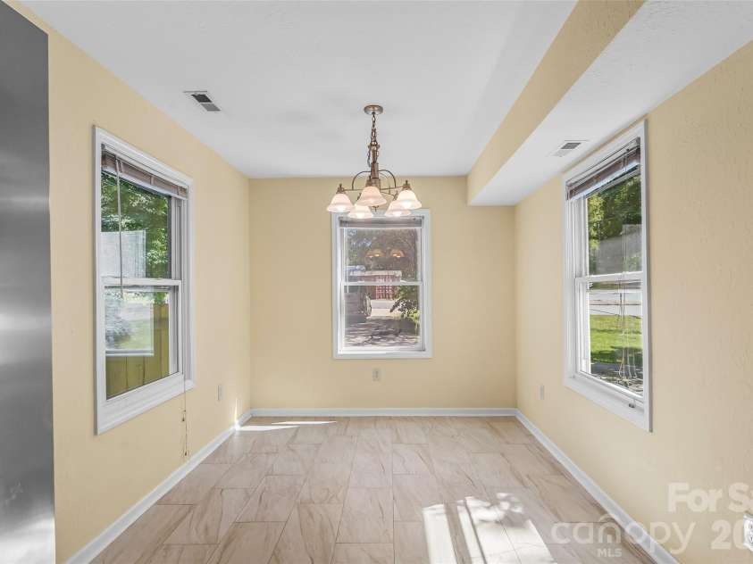 221 Old US 70 Highway, Black Mountain, NC 28711.  MLS# CAR4428079, YatesRealty ID 53812. Sunny dining area