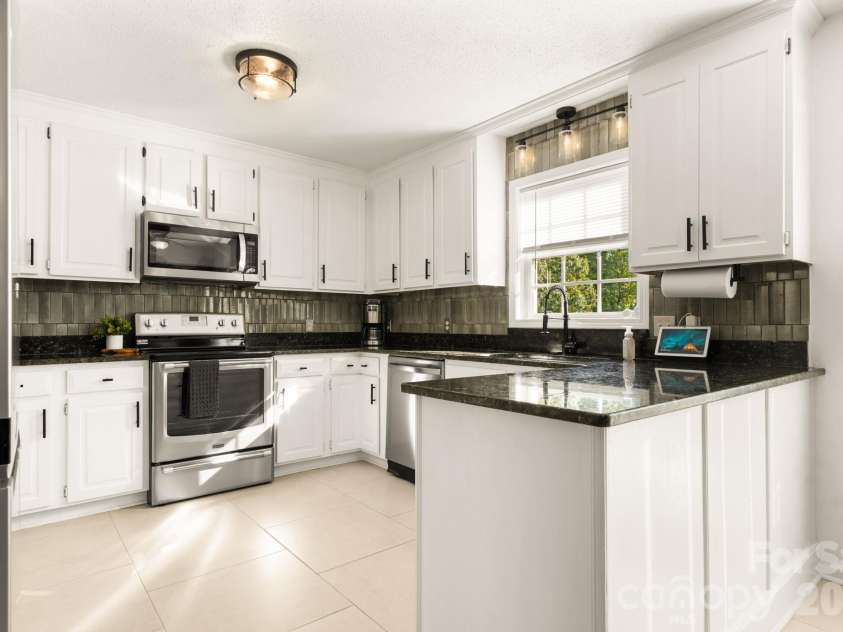 237 Scotts Creek Road, Statesville, NC 28625.  MLS# CAR4429792, YatesRealty ID 53828. 