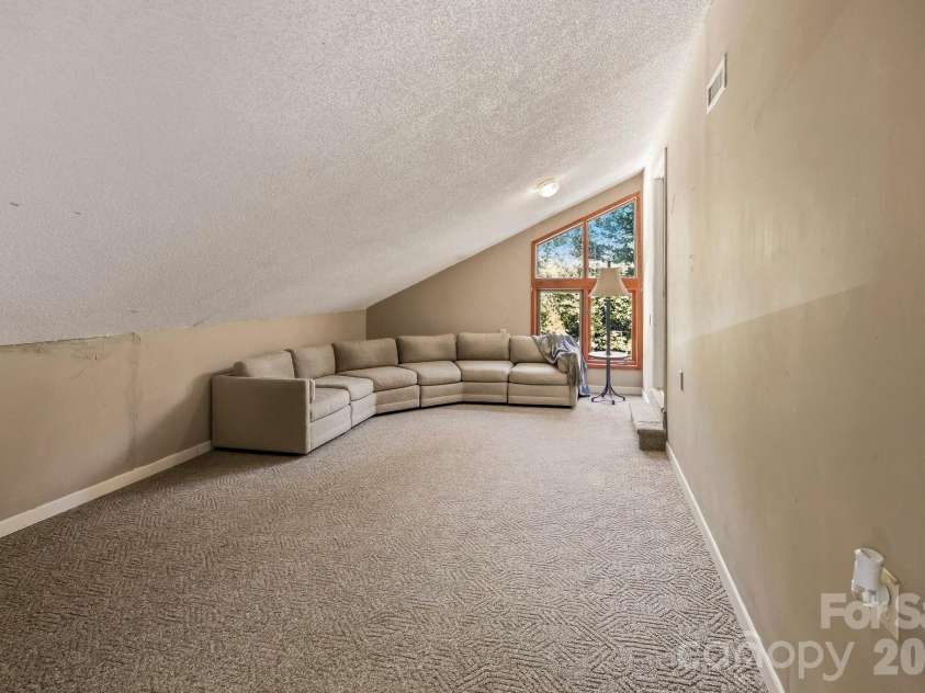 124 Moss Hill Lane, Lake Lure, NC 28746.  MLS# CAR4429625, YatesRealty ID 53837. 