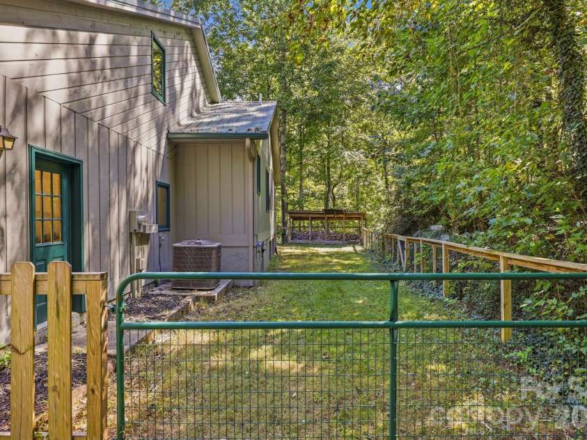 124 Moss Hill Lane, Lake Lure, NC 28746.  MLS# CAR4429625, YatesRealty ID 53837. 