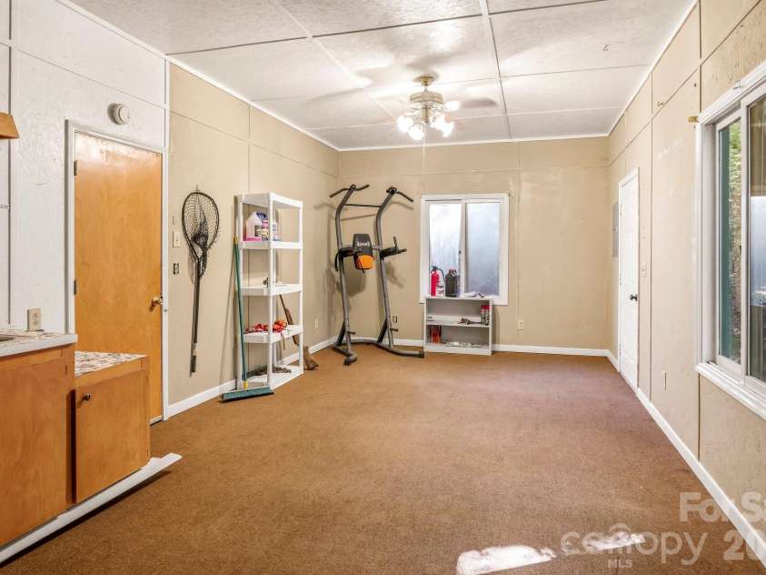 124 Moss Hill Lane, Lake Lure, NC 28746.  MLS# CAR4429625, YatesRealty ID 53837. 