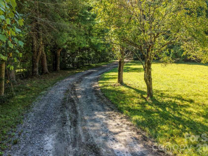 124 Moss Hill Lane, Lake Lure, NC 28746.  MLS# CAR4429625, YatesRealty ID 53837. 