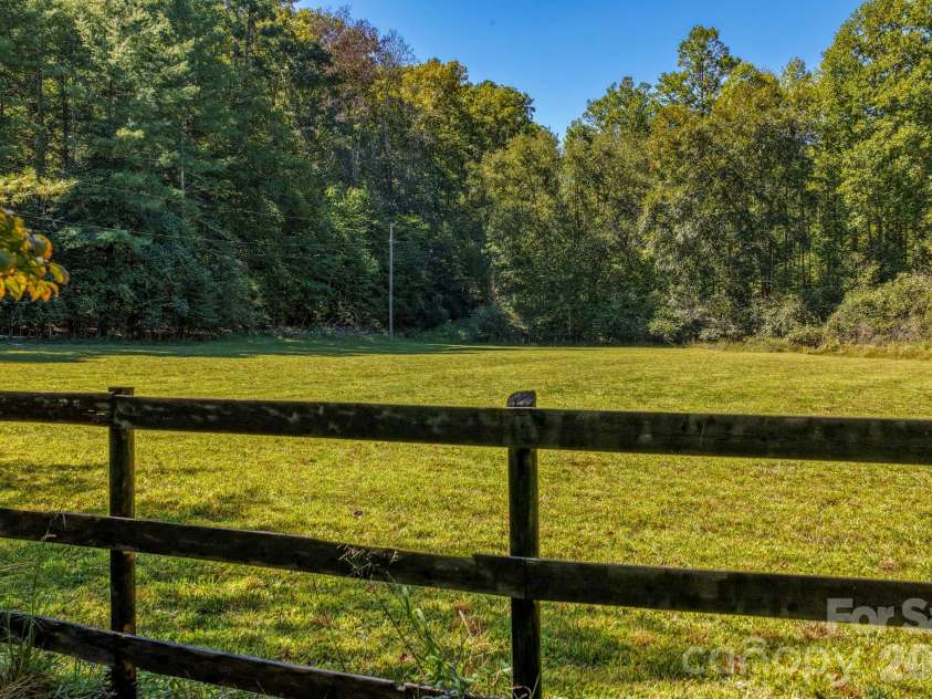 124 Moss Hill Lane, Lake Lure, NC 28746.  MLS# CAR4429625, YatesRealty ID 53837. 