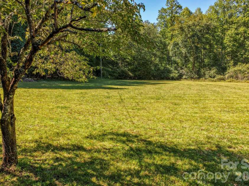 124 Moss Hill Lane, Lake Lure, NC 28746.  MLS# CAR4429625, YatesRealty ID 53837. 