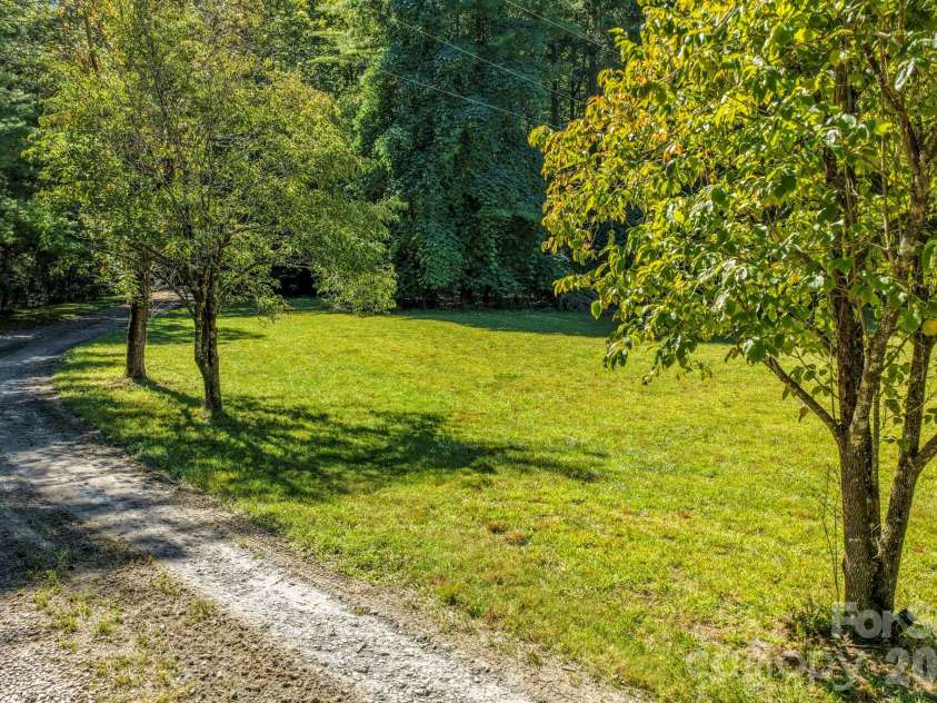 124 Moss Hill Lane, Lake Lure, NC 28746.  MLS# CAR4429625, YatesRealty ID 53837. 