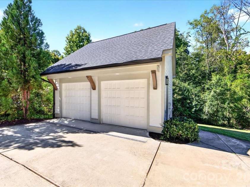 416 Woodland Street, Davidson, NC 28036.  MLS# CAR4425891, YatesRealty ID 53849. Detached garage with an unfinished space (accessed through interior stairs) above it that could be finished for additional living areas