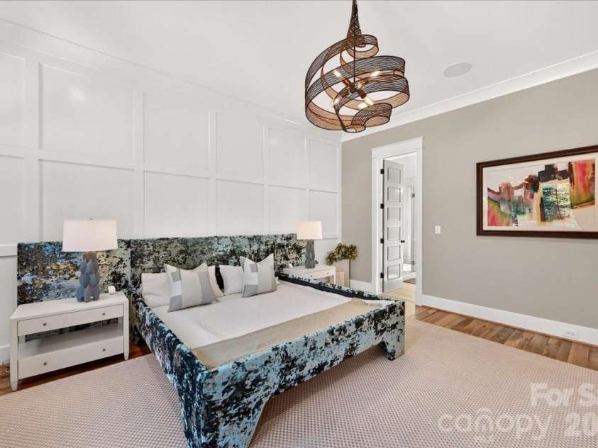 416 Woodland Street, Davidson, NC 28036.  MLS# CAR4425891, YatesRealty ID 53849. Gorgeous millwork on the feature wall behind the bed