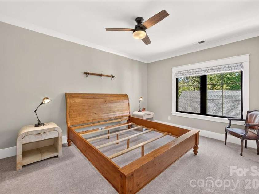 416 Woodland Street, Davidson, NC 28036.  MLS# CAR4425891, YatesRealty ID 53849. Spacious Bedroom #4 overlooking the backyard