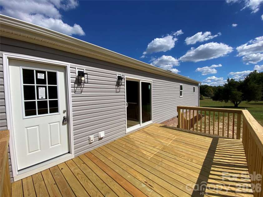 5726 Landon Place, Heath Springs, SC 29058.  MLS# CAR4429473, YatesRealty ID 53855. Rear deck w/ stairs