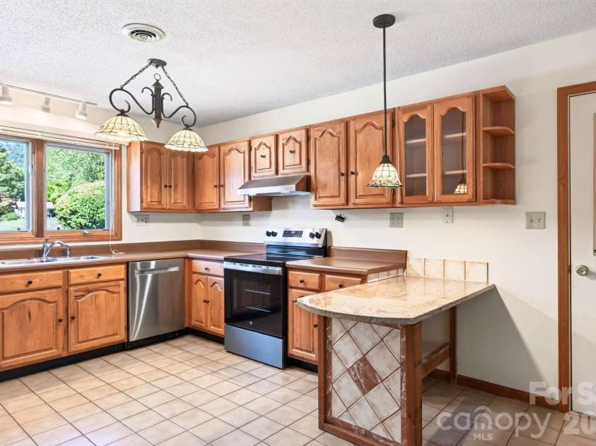 15A Windflower Court, Asheville, NC 28805.  MLS# CAR4429654, YatesRealty ID 53859. 