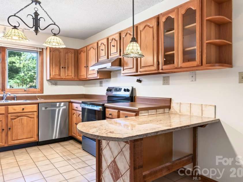 15A Windflower Court, Asheville, NC 28805.  MLS# CAR4429654, YatesRealty ID 53859. 