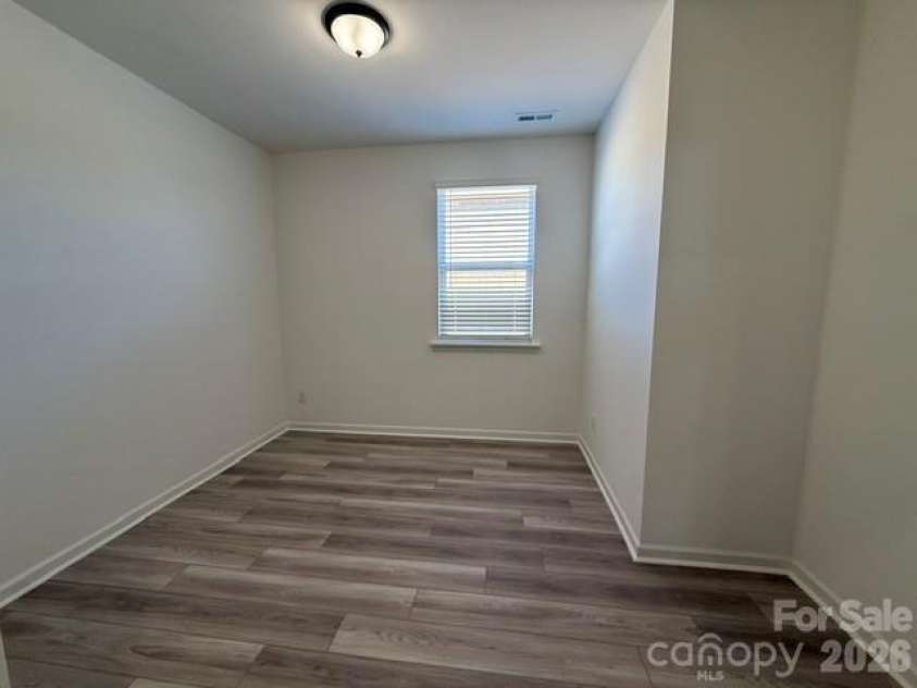313 Barnstable Drive, Monroe, NC 28110.  MLS# CAR4429785, YatesRealty ID 53868. Den area