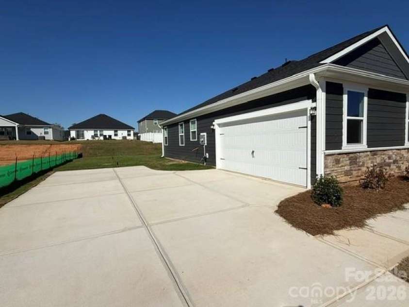313 Barnstable Drive, Monroe, NC 28110.  MLS# CAR4429785, YatesRealty ID 53868. Side Entry Garage