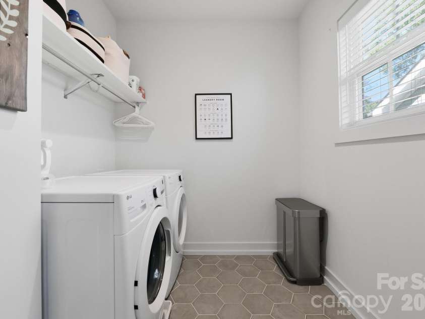 5212 Lynnville Avenue, Charlotte, NC 28205.  MLS# CAR4429076, YatesRealty ID 53877. Upper floor laundry