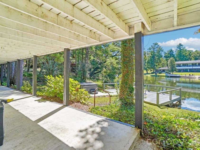 52 Lake Jordan Drive, Flat Rock, NC 28731.  MLS# CAR4425965, YatesRealty ID 53878. Deck by Game room