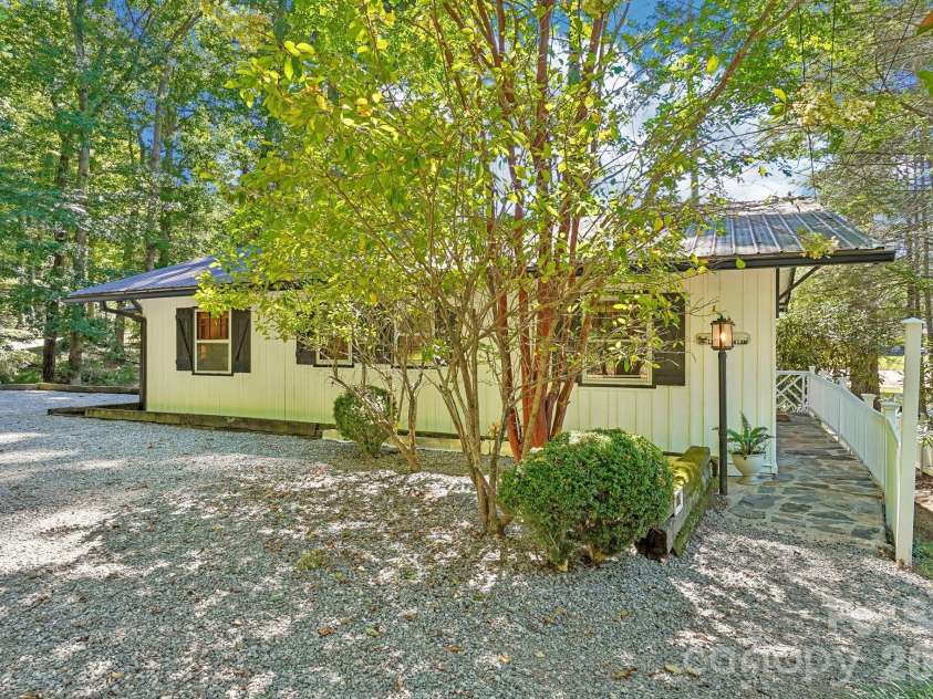 52 Lake Jordan Drive, Flat Rock, NC 28731.  MLS# CAR4425965, YatesRealty ID 53878. Front View