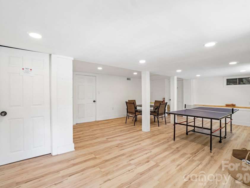 52 Lake Jordan Drive, Flat Rock, NC 28731.  MLS# CAR4425965, YatesRealty ID 53878. Game room with separate entrance