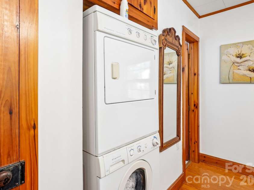 52 Lake Jordan Drive, Flat Rock, NC 28731.  MLS# CAR4425965, YatesRealty ID 53878. Laundry in Primary Suite