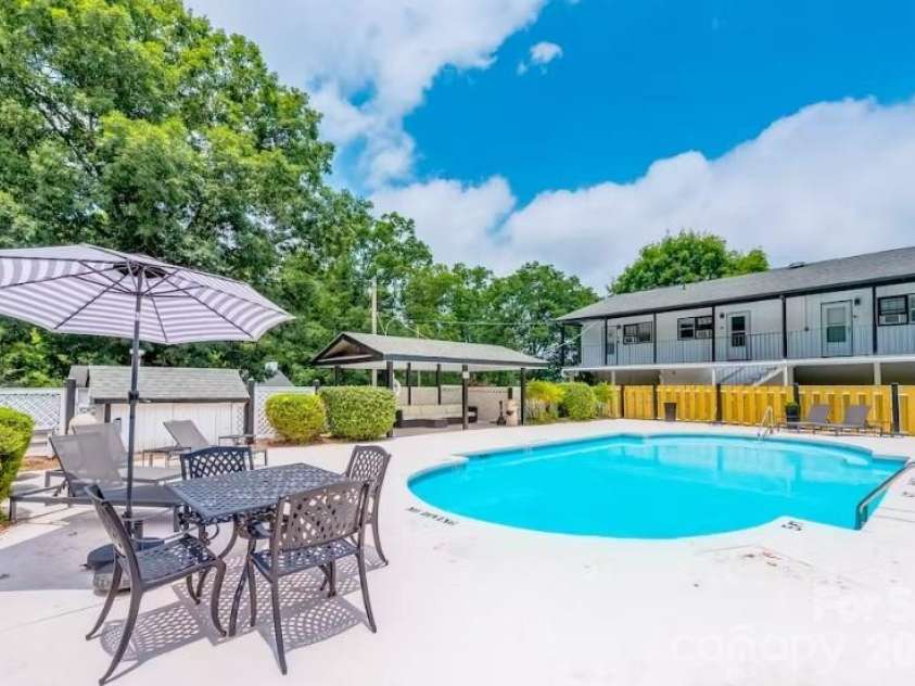 52 Lake Jordan Drive, Flat Rock, NC 28731.  MLS# CAR4425965, YatesRealty ID 53878. Pool