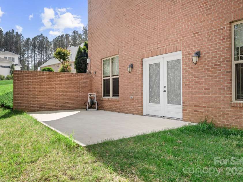 164 Crooked Branch Way, Troutman, NC 28166.  MLS# CAR4241614, YatesRealty ID 5388. Walk-out Basement -Concrete pad, private area perfect for a Hot Tub