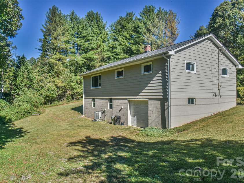 505 Monte Vista Road, Candler, NC 28715.  MLS# CAR4429414, YatesRealty ID 53896. Garage in basement. This could be be a large doorway and a finished lower level.