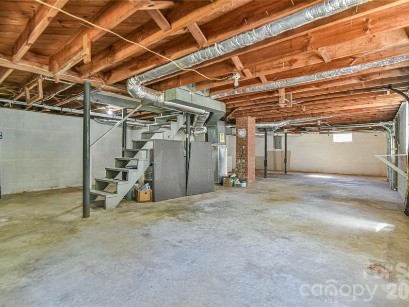 505 Monte Vista Road, Candler, NC 28715.  MLS# CAR4429414, YatesRealty ID 53896. Unfinished Basement.