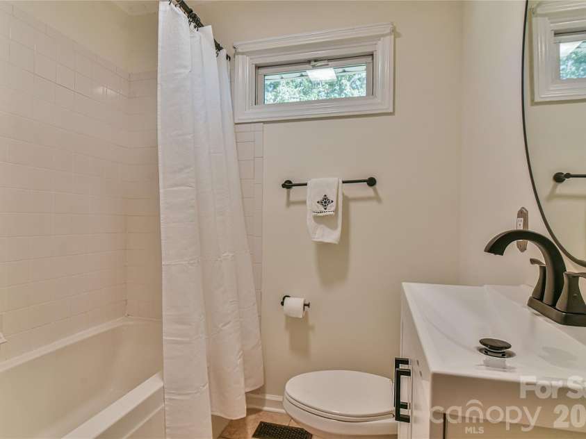 505 Monte Vista Road, Candler, NC 28715.  MLS# CAR4429414, YatesRealty ID 53896. Updated Guest Bath