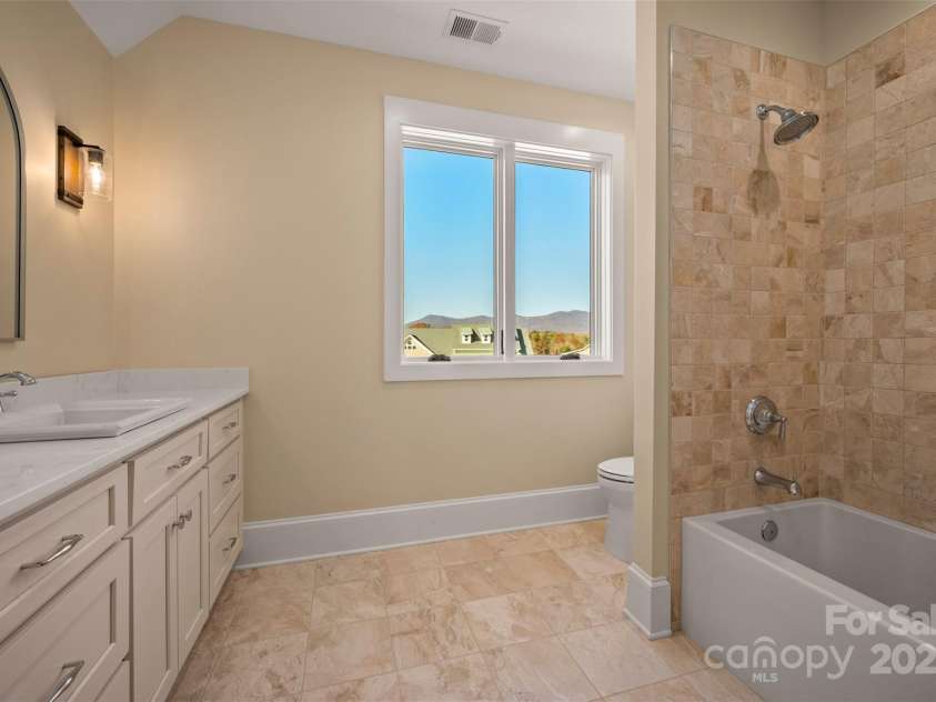 297 Mountain Meadows Lane, Tryon, NC 28782.  MLS# CAR4322255, YatesRealty ID 539. 