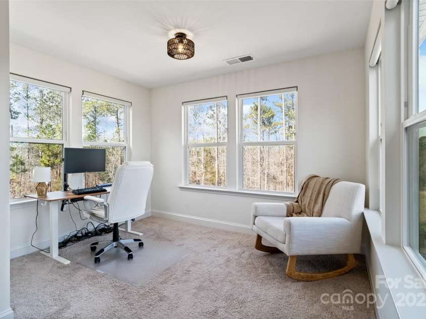 416 Clemson Tree Lane, Lake Wylie, SC 29710.  MLS# CAR4223424, YatesRealty ID 5391. Primary bedroom's extension/ sunroom