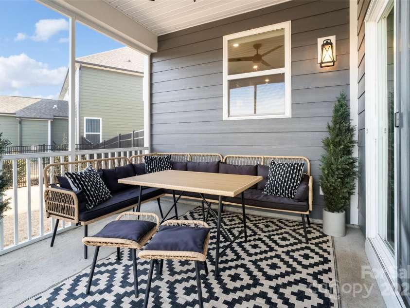 416 Clemson Tree Lane, Lake Wylie, SC 29710.  MLS# CAR4223424, YatesRealty ID 5391. Screened in porch and extended patio beyond; in the backyard