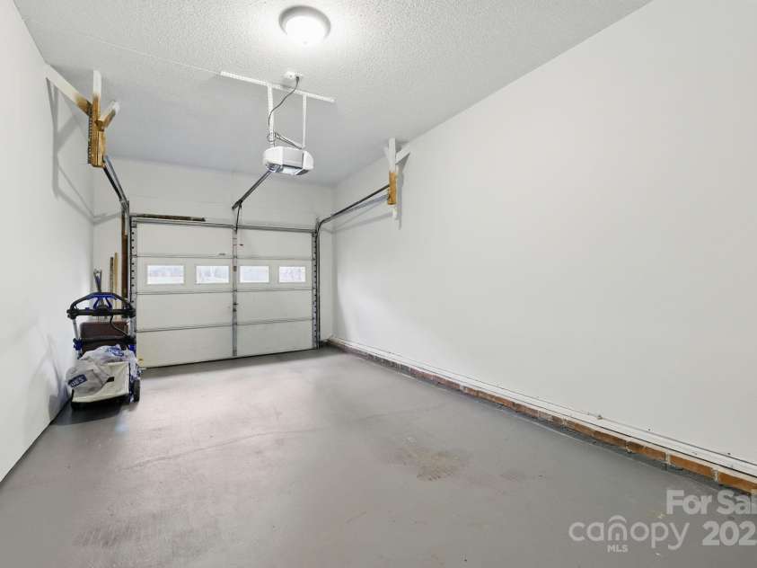 718 White Sparrow Drive, Hendersonville, NC 28792.  MLS# CAR4233485, YatesRealty ID 5392. One car garage