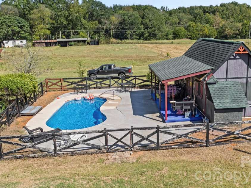 3627 Edwards Road, Wingate, NC 28174.  MLS# CAR4427215, YatesRealty ID 53920. Huge pool house
