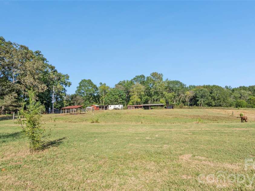 3627 Edwards Road, Wingate, NC 28174.  MLS# CAR4427215, YatesRealty ID 53920. Open pastures