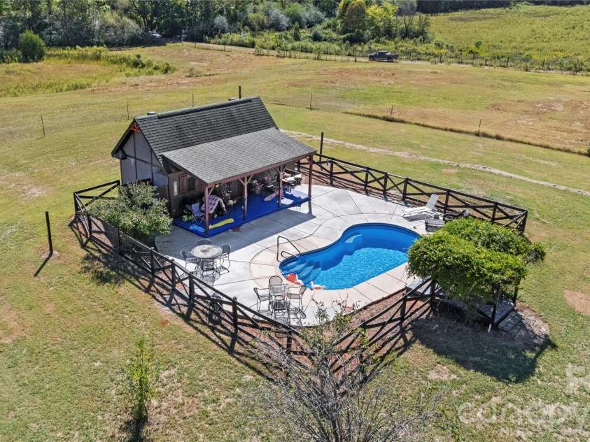 3627 Edwards Road, Wingate, NC 28174.  MLS# CAR4427215, YatesRealty ID 53920. Saltwater pool