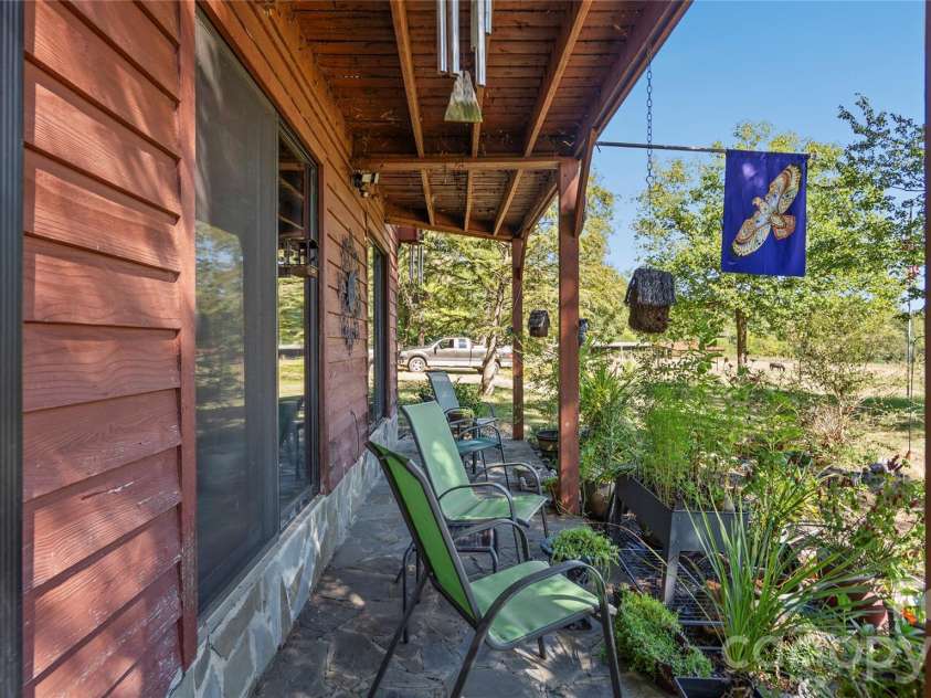 3627 Edwards Road, Wingate, NC 28174.  MLS# CAR4427215, YatesRealty ID 53920. Side porch