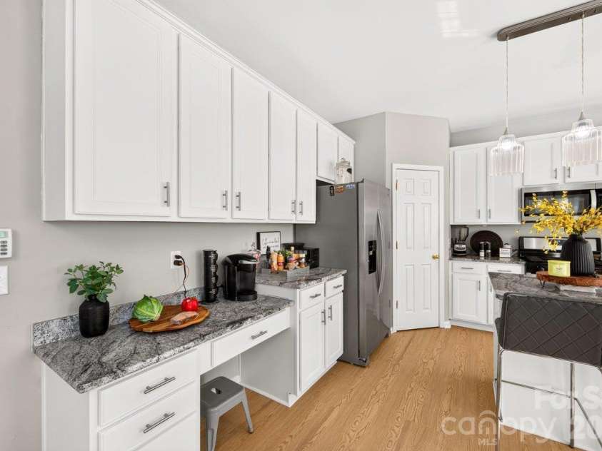 10536 Adlin Avenue, Charlotte, NC 28262.  MLS# CAR4429740, YatesRealty ID 53922. Built-in desk area in the kitchen